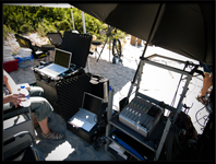 Portable Powerbook systems on the beach at Kastani during the filming of Mamma Mia!